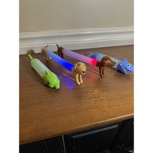 4pc LED Light Up Pop Tube Fidget Toys Animal Shark Dog Dolphin Sensory Set